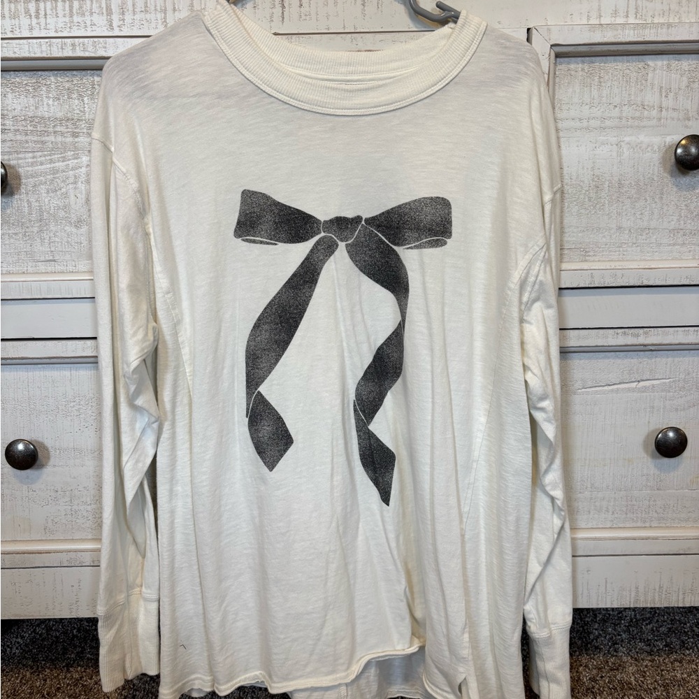 Women's White Long Sleeve Top with Black Bow Design
